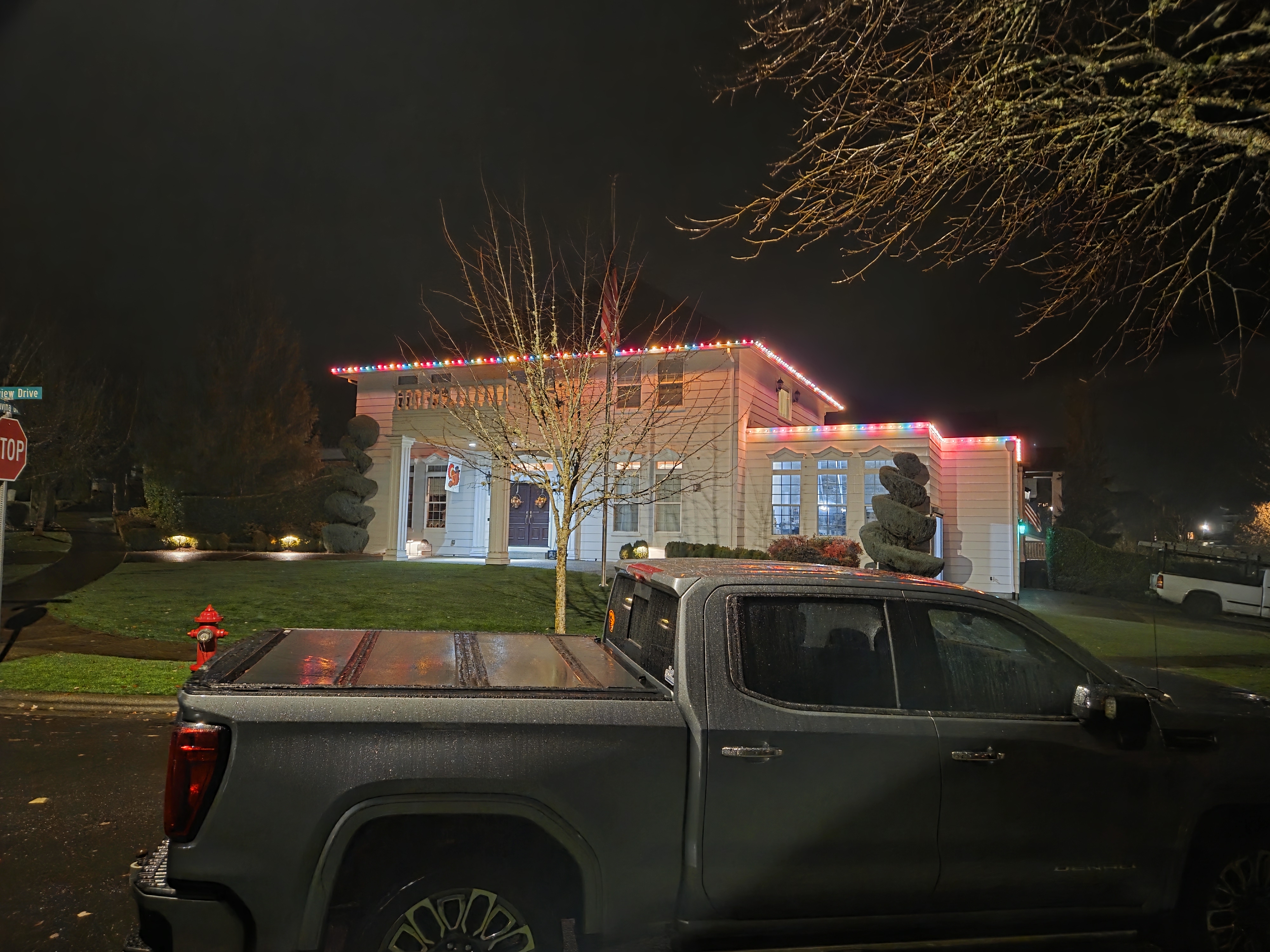 Red and white roofline lighting on a home