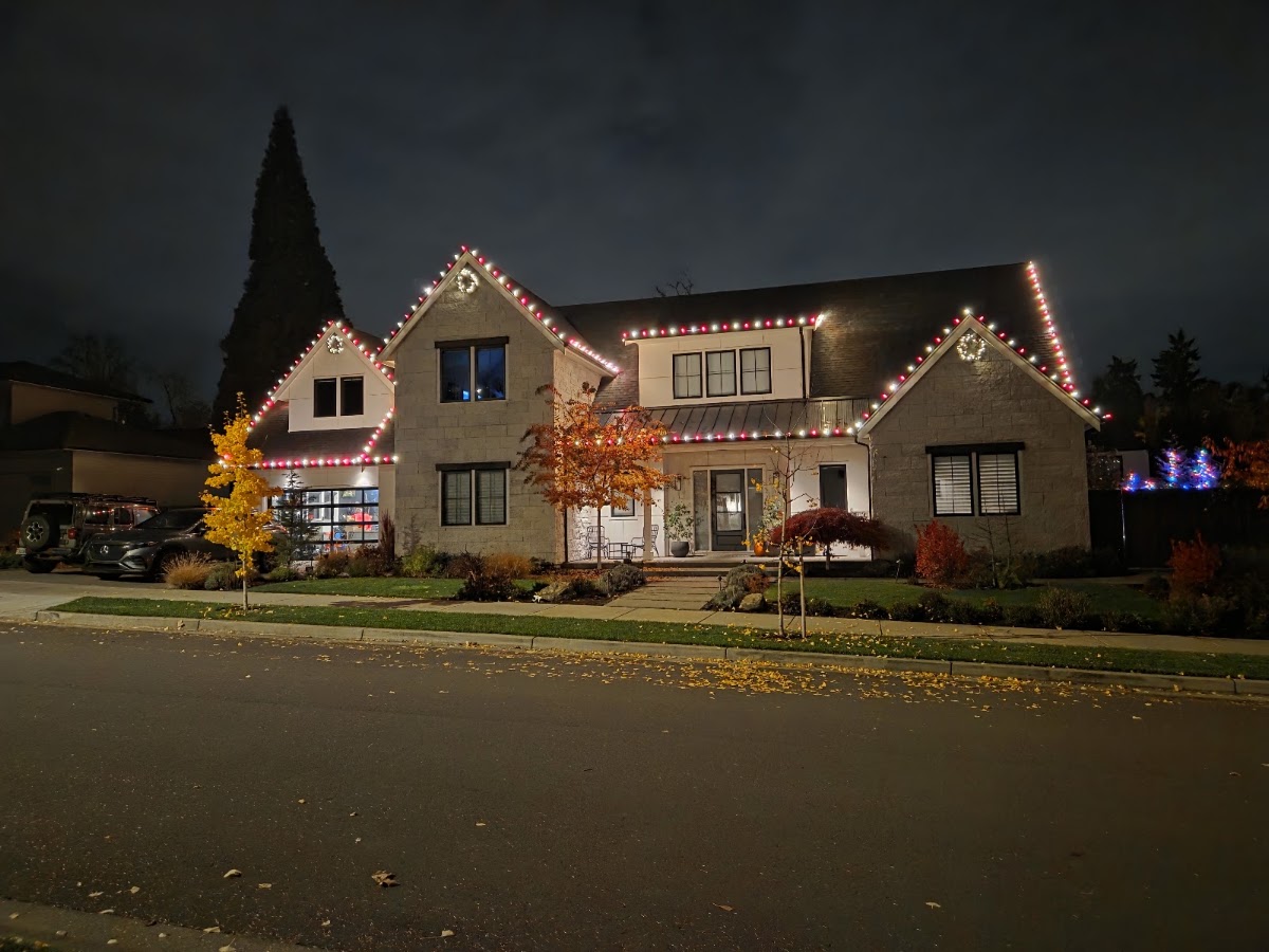 Red and white Christmas lights on a home