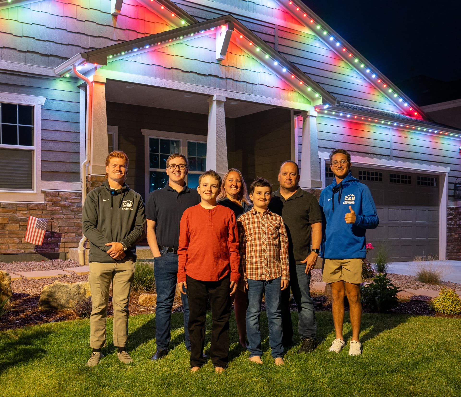 Got Lights LLC customers in front of their beautifully lit home